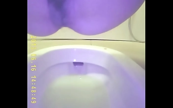 Witness The Sensual Pleasure Of A Young Asian Beauty Peeing In The Bathroom