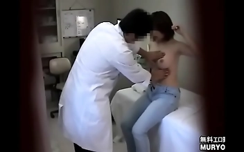 Sexy 21-Year-Old Kumi Exposes Her Big Beautiful Breasts During A Revealing Obstetrician Exam